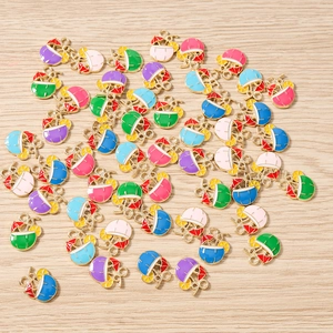 Macro shot of colorful tropical drink charms with tiny umbrellas and lemon slices