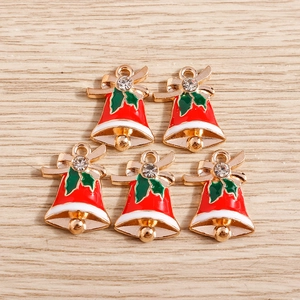 5-piece set of red and white enamel Christmas bell charms with holly leaf and rhinestone detail