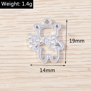Detailed view of 19x14mm silver bear pendant with bowknot and rhinestone inlay