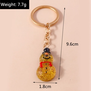 Detail of glittery snowman keychain with dimensions 9.6cm length and 7.7g weight