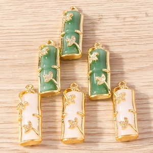 Bamboo shaped pendants in jade-like stone and gold finish for jewelry making