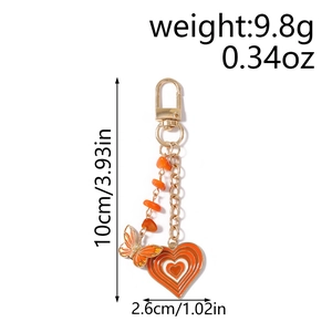 Fashion heart and butterfly keychain with orange beads in gold alloy finish