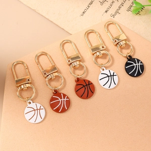 Five assorted colors of basketball keychain pendants with gold metal rings for bags