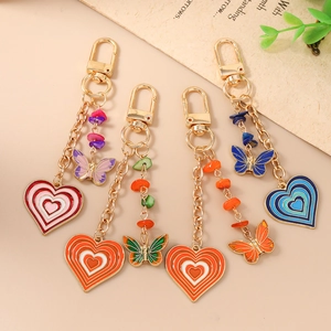Chic butterfly heart keychains in four colors with gold metal hooks and colorful stone beads