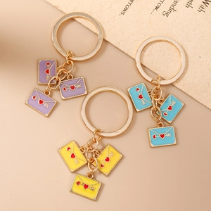 Fashionable heart envelope keychains in purple yellow and blue colors for bag decor