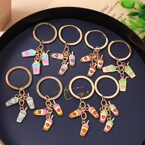 Chic milk tea cup keychain set with gold alloy rings and heart patterns in various colors