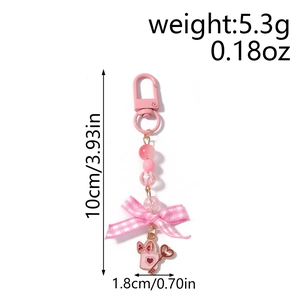 Pink beaded heart keychain detail with bow and lock charm showing size 10cm weight 5.3g