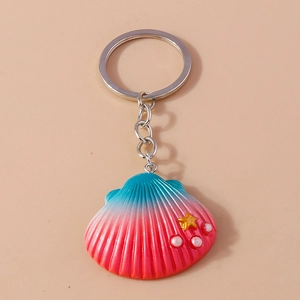 Ocean style seashell keychain with pink and blue gradient, pearls and star charm