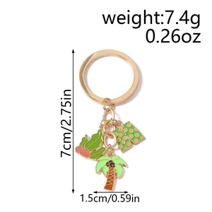Detail showing tropical keychain dimensions with cactus, coconut tree, and shorts charms