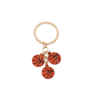 Porte-clés sportif tendance avec trois pendentifs basketball et anneau doré poli