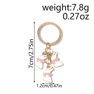 Détails du porte-clés lapin mignon avec émail blanc, nœuds roses et dimensions précises
