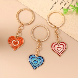 Lot de porte-clés en forme de cœur orange bleu et rose avec finition dorée