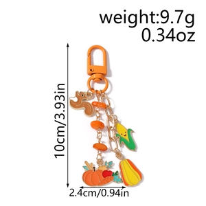 Detailed size chart for autumn squirrel keychain showing weight 9.7g and 10cm length