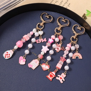 Star beaded teddy bear keychain set with rainbow heart pendants and 1314 charms