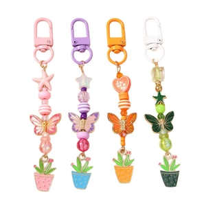 Porte-clés perlés avec étoiles de mer et papillons et breloques de succulentes