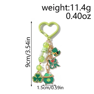 Detail showing St. Patrick's Day keychain with green beads and shamrock charms