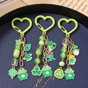 St. Patrick's Day beaded keychain set featuring lucky clover charms and green shamrocks