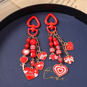 Red heart-shaped keychain set with beaded charms and gold metal alloy clips for bags