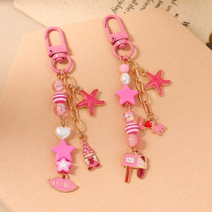 Pink star and starfish keychain set with beaded gnome, love charms and mailbox pendant