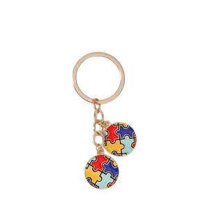 Porte-clés créatif en forme de cœur avec pièces de puzzle dorées et finitions en émail