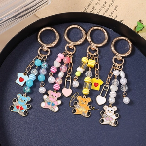 Porte-clés ours à perles tendance en bleu, rose, jaune et blanc pour breloques de sac
