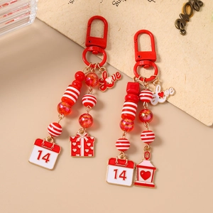 Red beaded keychain set with Love pendant and February 14 calendar charm for Valentine