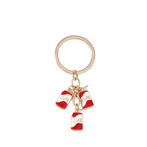 Fashionable keychain featuring three red cola can pendants on a gold-tone metal ring