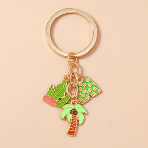 Detailed view of beach themed keychain with tropical palm tree and starfish charms