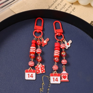 Fashionable red beaded keychain with Love charm and February 14th calendar pendant