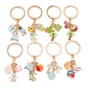 Summer beach keychain set featuring starfish coconut tree and seashell bag charms