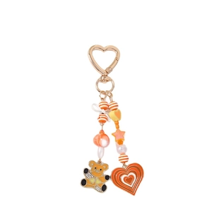 Beaded keychain with cartoon bear and orange heart pendant for bags and purses