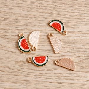 DIY jewelry charms featuring semi-circular watermelon enamel pendants for bracelets