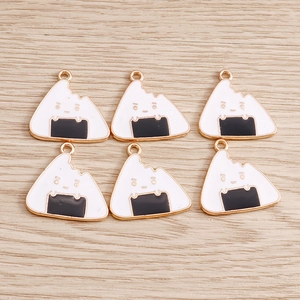 6-piece set of cartoon rice ball enamel alloy pendants with golden hooks on wood