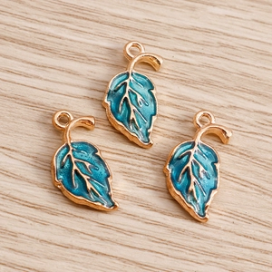 Three enamel maple leaf pendants in turquoise and gold for DIY jewelry making