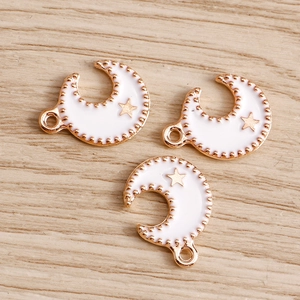 Set mit goldfarbenen Mondsichel-Anhängern aus Emaille und Stern für DIY-Schmuck
