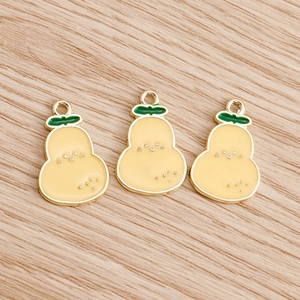 Three cute yellow pear charms made of enamel alloy for DIY jewelry making and crafting