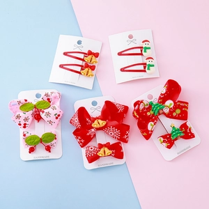 Christmas hair clips set for girls featuring bows, snowmen and resin holiday patterns