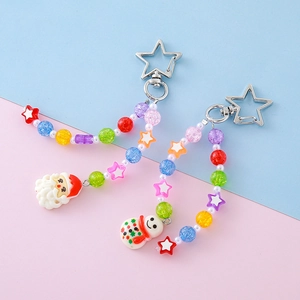 Christmas snowman and Santa Claus beaded keychains with star-shaped metal clasps