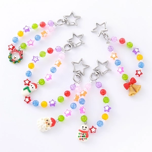 Festive Christmas beaded keychains featuring Santa, snowman, and star pendants for bags