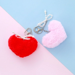 Plush heart keychain set in red and pink with pearl bow and silver metal clasp