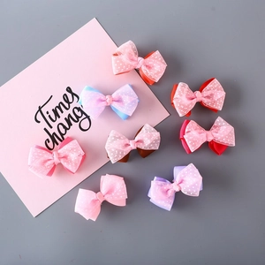 Set van 8 kleurrijke strikjes haarclips met stippen voor meisjes in diverse kleuren