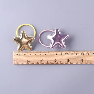Star-shaped PU leather hair ties for kids in gold and purple with size reference