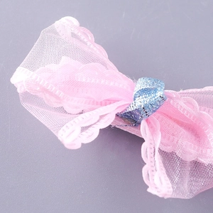 Pink lace mesh bow hair clip for girls with blue sequin ribbon detail and soft texture