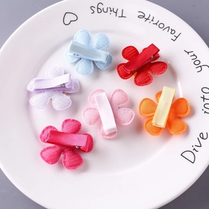 Set of 6 colorful fabric flower hair clips for girls in blue, red, pink, and yellow