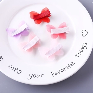 Lot de cinq pinces à cheveux papillon en organza élégant et rubans colorés doux