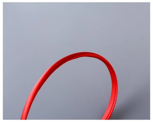 Detail showing red satin fabric wrapping and precise stitching on a 1cm slim kids headband