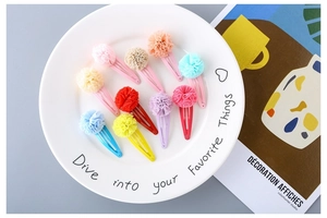 Close-up of 10-piece colorful mesh flower hair clips for girls in macaron shades