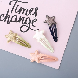 Sparkly star-shaped BB hair clips set for girls featuring glitter powder and fabric finishes