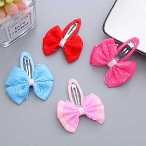 Set of four sweet handmade lace bow hair clips for girls in red, blue, and pink colors