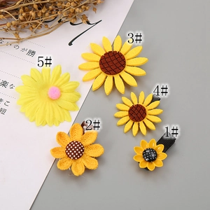 Five styles of yellow sunflower hair clips and floral accessories for girls and women